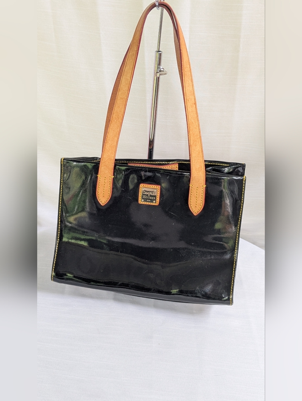 Dooney & Bourke Black Patent Tote with Tan Leather Handles